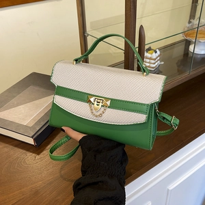 Elegante borsa Kelly in pelle verde e tweed con chiusura dorata e tracolla regolabile