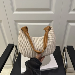 Handmade woven hobo bag with brown leather knotted handle and retro ivory knit texture