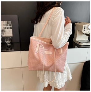 Detailed view of pink woven texture on large tote bag with Fashion & Bags leather label