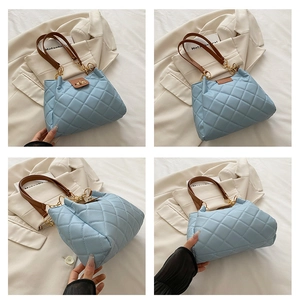 Detailed views of sky blue quilted tote bag showing turn-lock closure and leather straps