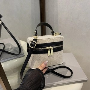 Retro canvas and black leather box handbag with gold metal hardware and top handle