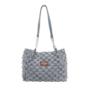 Blue denim checkerboard tote bag with distressed edges and metal chain strap