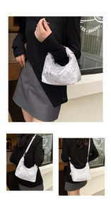 Detail of light purple Chinese embroidery hobo bag with tassel and floral patterns