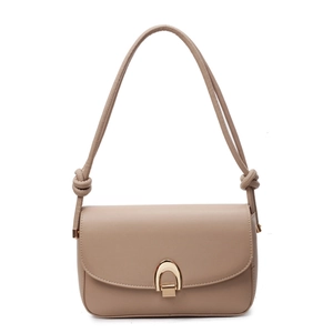 Minimalist beige leather square shoulder bag with gold horseshoe buckle and knotted strap