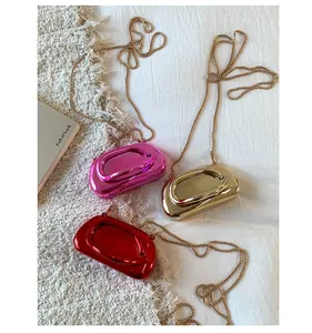 Chic mini metallic acrylic evening bags in rose pink, gold and red with chain straps