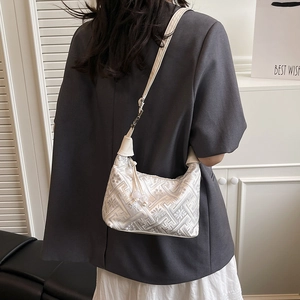 Elegant pearl white half-moon shoulder bag with traditional embroidery and pearl charm