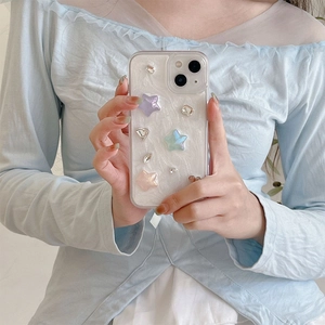Star-patterned iPhone case with colorful 3D stars and rhinestones on pearlescent base