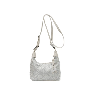 Ethnic style hobo tote bag with embroidered swastika patterns and floral details