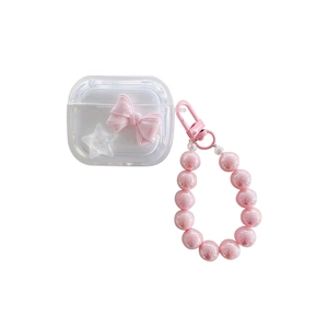 Clear AirPods case with pink 3D bow and star charms including a beaded hand strap