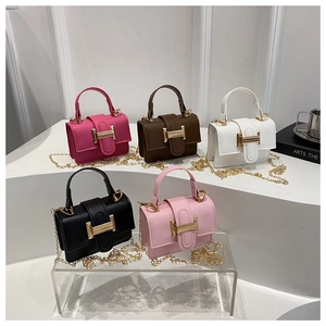 Detailed display of mini PU leather handbags with golden H-buckles in five colors
