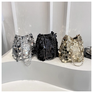 Detailed trio of sequin bucket bags in silver, black and champagne gold with chain straps
