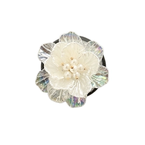 3D pearlescent shell flower phone socket with iridescent petals and central pearls
