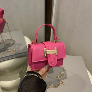 Magenta mini leather handbag with gold metal clasp and chain strap for women
