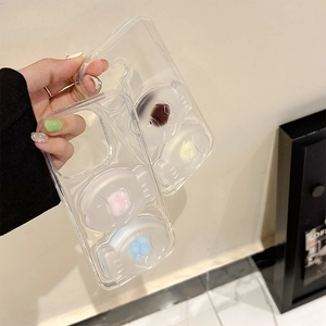 Close-up of clear phone case with 3D colorful silicone cartoon dolls for iPhone models