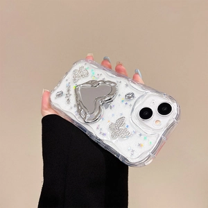 Detail of glitter iPhone case with heart mirror stand and sparkling diamond butterflies