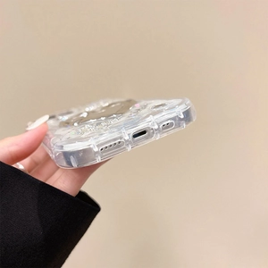 Detail of glittered iPhone case showing precise bottom cutouts and reinforced corners