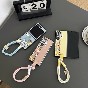 Set of three colorful leather foldable phone cases featuring cute cartoon dog designs and straps