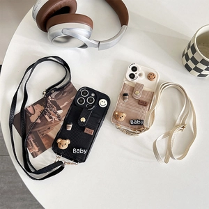 Crossbody iPhone case with card holder and cute bear coffee design on a white table
