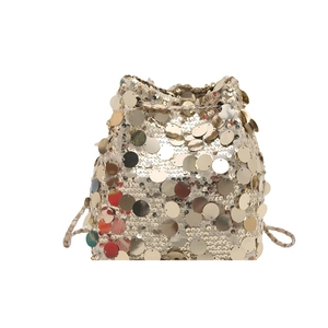 Sparkly gold sequin bucket bag for women with drawstring closure and chic chain strap