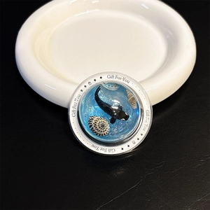 Macro view of ocean-themed phone grip with orca, shells, and 'Gift For You' text