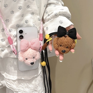 Détails de la coque de téléphone chiot en peluche avec bandoulière tressée et nœud