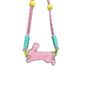 Pink rabbit acrylic phone charm with adjustable colorful braided strap and star pattern