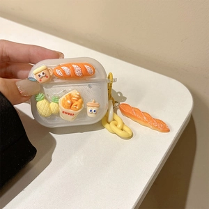 Detailed view of clear glitter AirPods case featuring 3D resin bread charms and chain