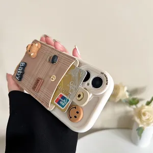 Close-up of cream iPhone case featuring a brown plaid card wallet and 3D plush bear