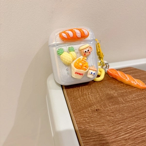 Close-up of clear glitter AirPods case with 3D resin bread and fries charms