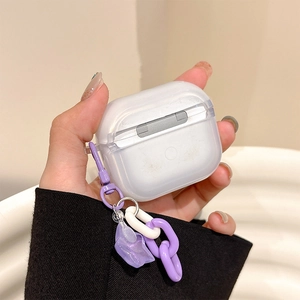 Translucent AirPods case with purple star charm and chunky chain accessory detail