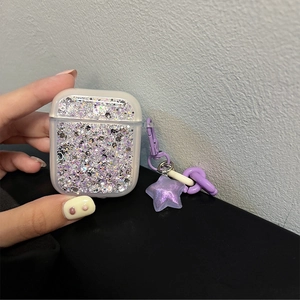 Sparkly purple glitter AirPods case featuring a matching star pendant and thick chain strap
