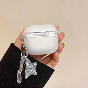 Detail of transparent AirPods case featuring a sparkling silver star glitter pendant