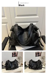 Detailed texture of black PU leather on large capacity tote bag with zipper closure