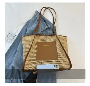 Size comparison of large woven tote bag next to a smartphone showing spacious capacity