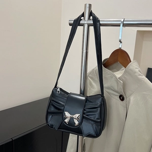 Minimalist black handbag with bow design and silver metal buckle for women fashion
