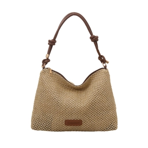 Minimalist beige woven tote bag with brown PU straps and a small leather fashion patch