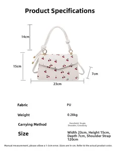 Detailed size specifications for the white PU handbag featuring red cherry prints
