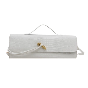 White faux crocodile leather handbag with elegant gold knot clasp and slim shoulder strap