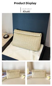 Detail view of khaki woven clutch bag with textured wavy patterns in a luxury gift box
