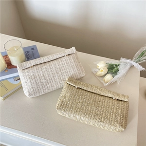 Women's summer straw woven envelope clutch bag in beige and brown bohemian style
