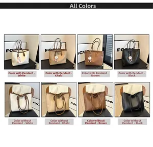 Grid display showing large capacity tote bags in four colors with cute doll pendants