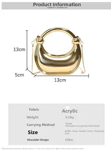 Macro view of metallic gold crescent bag with acrylic finish and long chain strap detail