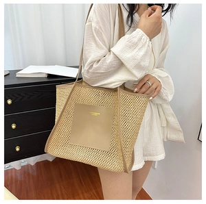 Detail shot of beige woven tote bag showing premium mesh texture and leather logo patch
