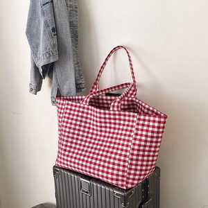 Large capacity red gingham canvas tote bag with dual handles for travel and shopping