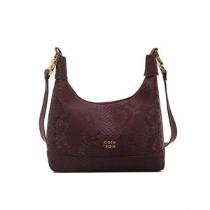 Burgundy faux snakeskin dumpling shoulder bag with gold metal buckle and pleated design