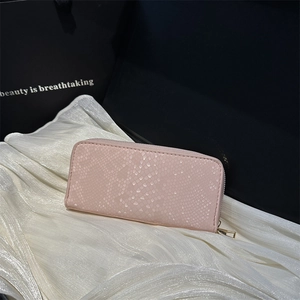 Pink quilted embossed long wallet for women with golden zipper on white satin