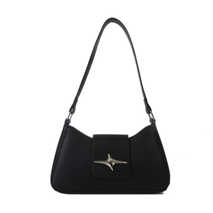 Minimalist black faux leather shoulder bag with a silver star buckle on a white background