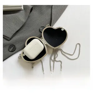 Mini borsa a cuore in metallo argento con interno per custodia per auricolari