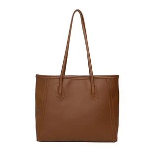 Classic brown tote bag with elegant vertical stitching and long shoulder straps