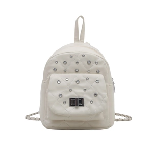 Quilted mini backpack in white with sparkling studs and metallic twist-lock closure